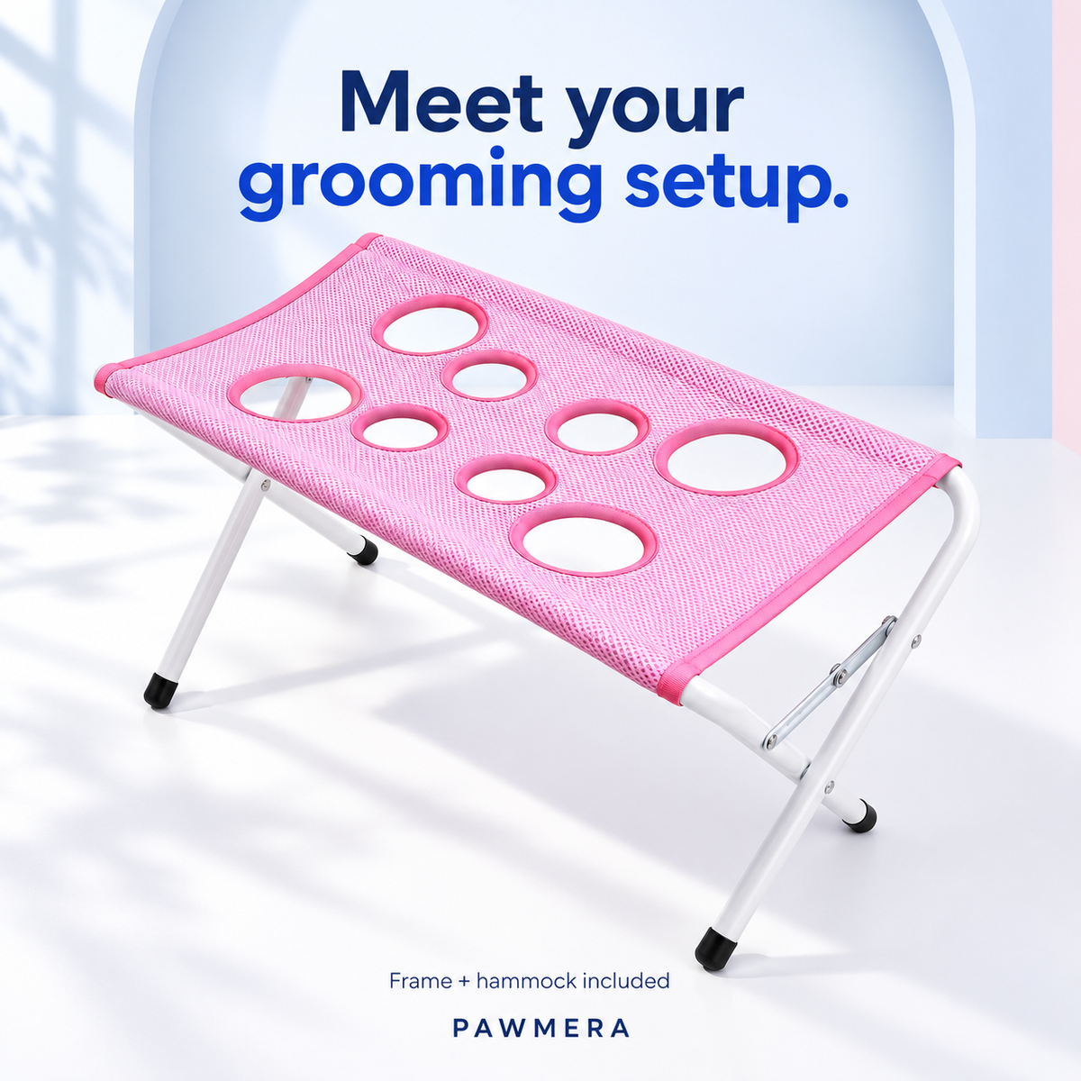 Pink Pawmera grooming stand with folding frame and mesh hammock — AI illustration